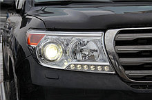 Защита фар/очки на Toyota Land Cruiser 200/Тойота Ланд Крузер 200 рестайлинг 2012- прозрачная