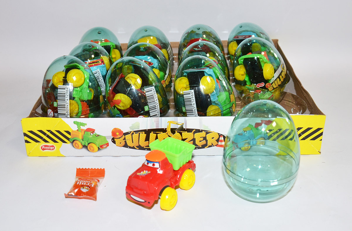 Яйцо с карамелью и игрушкой Бульдозер Bulldozer (12 шт в упаковке) - фото 1 - id-p67281415