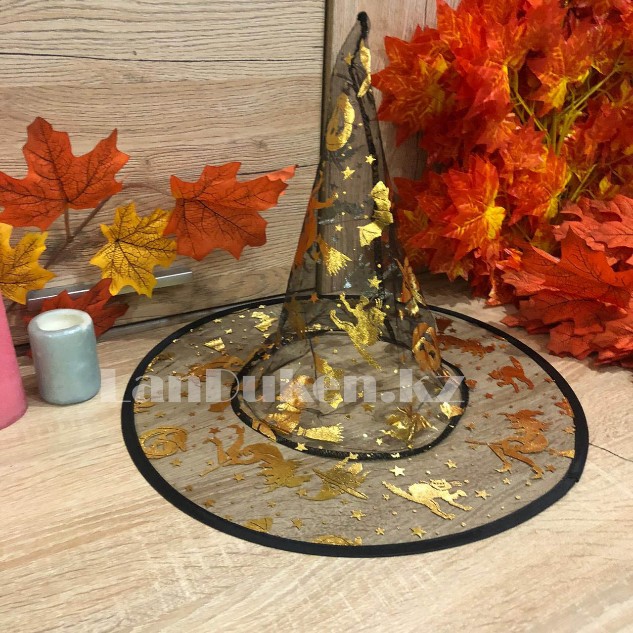 Шляпа ведьмы на Хэллоуин (Halloween) полупрозрачная черная с золотистым рисунком (высота 34 см)