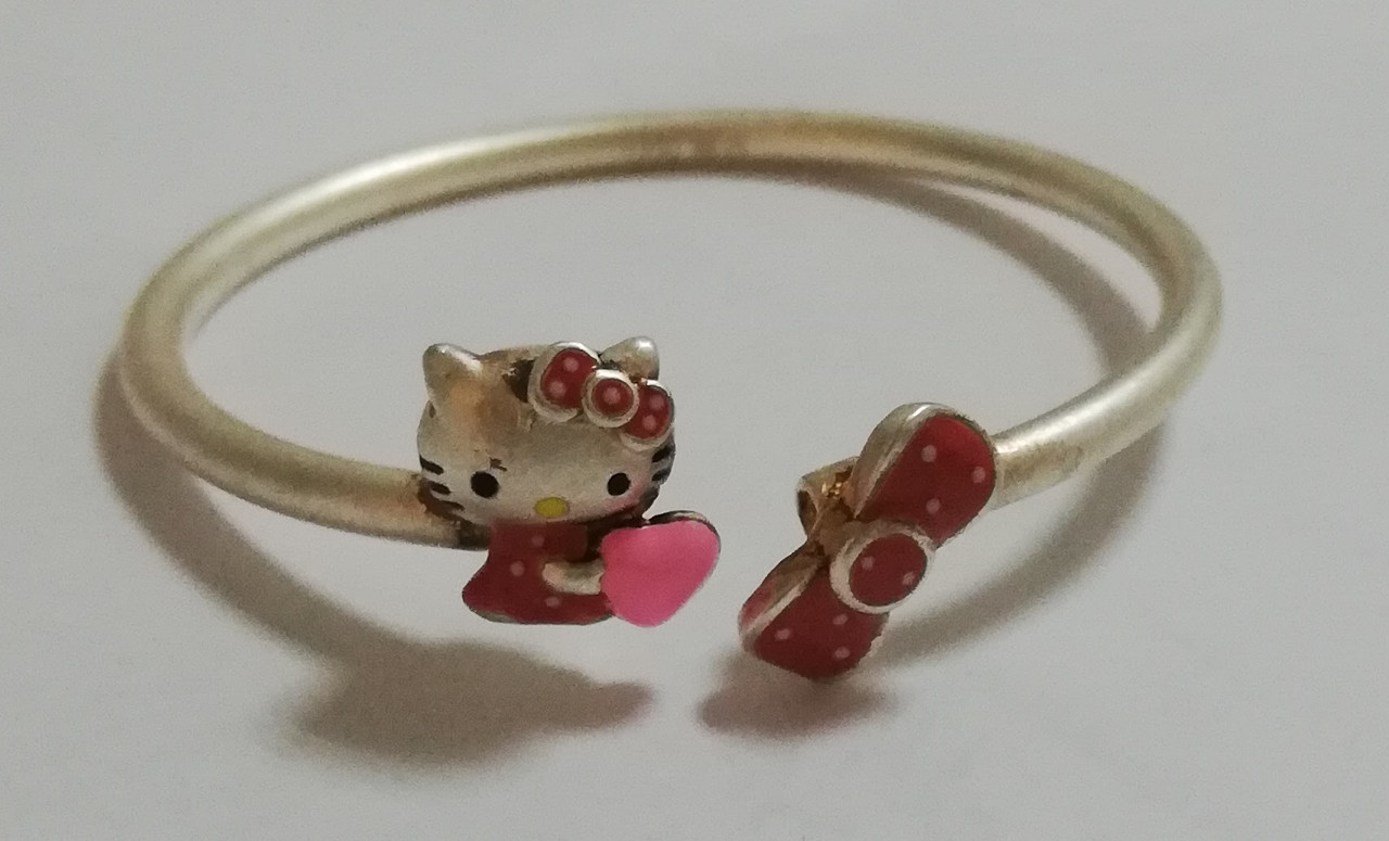 Детский серебряный браслет с "Hello Kitty" и бантик, из коллекции "Kids".Вставка: эмаль, вес: 11,65