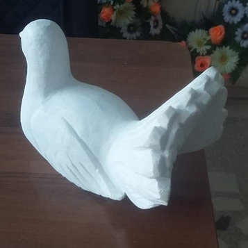 Мраморная скульптура голубь