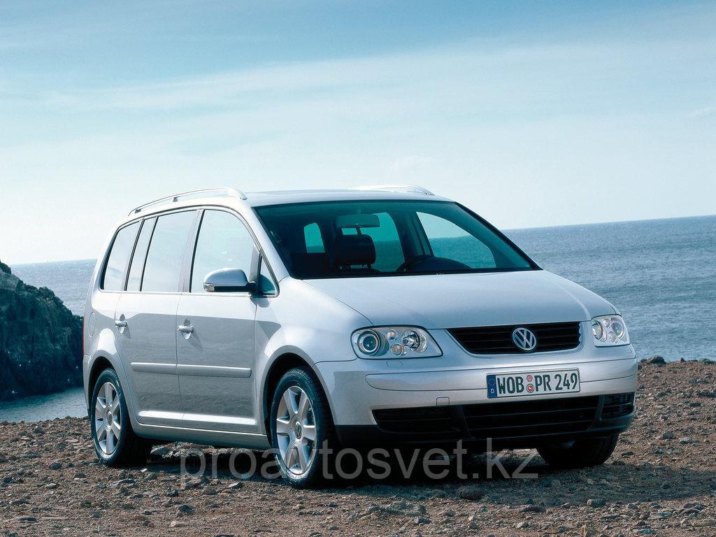 Переходные рамки на Volkswagen Touran I (Mk5) (2003-2006) с Bosch AL 3/3R на Hella 3/3R - фото 1 - id-p89278348