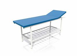 Кушетка для мануальной терапии с регулировкой подголовника и дополнительной полкой.