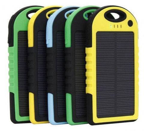 Аккумулятор для зарядки портативный на солнечной батарее с фонариком Solar Charger [5000 мАч.] (Желтый) - фото 1 - id-p92489110