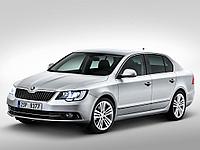 Переходные рамки на Skoda Superb 2013-2015 AFS для установки модулей Hella 3/3R