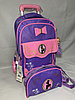 Школьный рюкзак на колесах для девочек, 1-3-й класс. Высота 50 см, ширина 30 см, глубина 20 см.