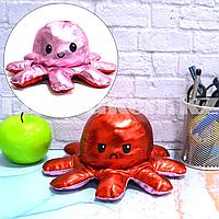 Мягкая игрушка перевертыш с улыбающимся и хмурящимся лицом осьминог розовый и красный с металлическим отливом