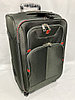 Маленький тканевый дорожный чемодан на 4-х колесах "Swessgear". Высота 57 см, ширина 36 см, глубина 24 см.