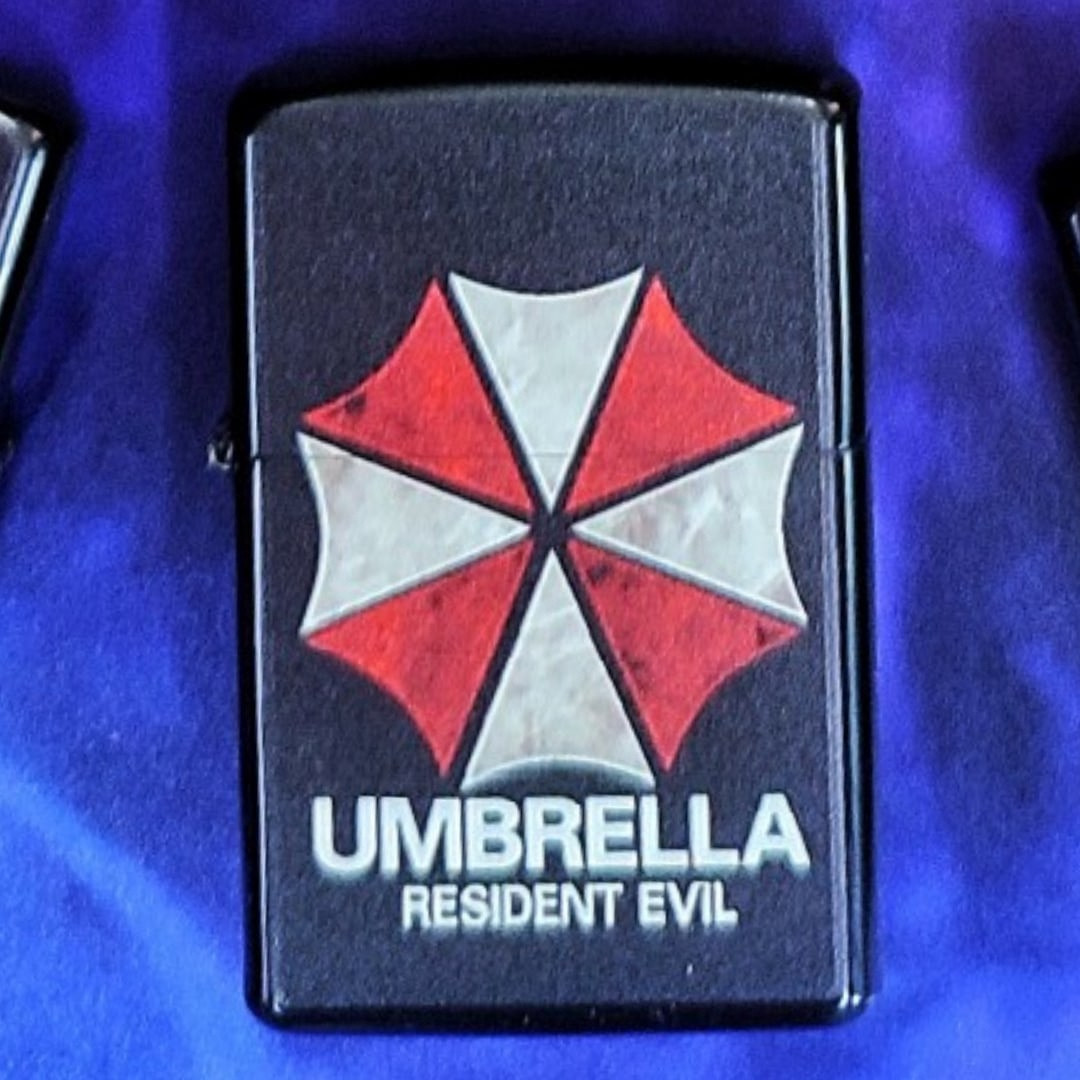 Бензиновые зажигалки в Ассортименте Umbrella (Resident Evil) - фото 1 - id-p99295538