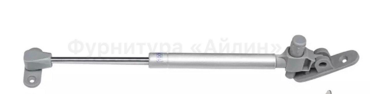 Амортизатор газовый N100 (10кг) верхнего открывания, с доводом, серый - фото 1 - id-p102325373