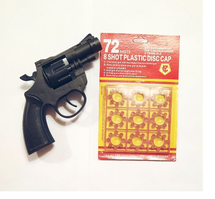 Револьвер игрушечный с пульками пистоны