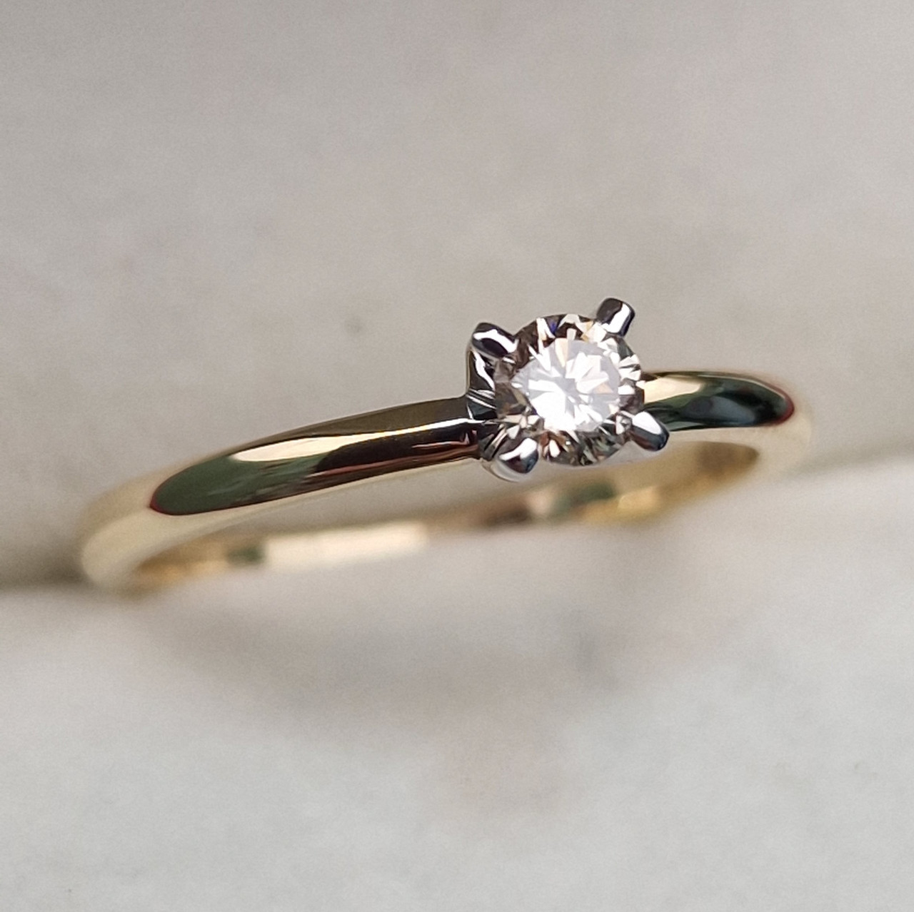Золотое кольцо с бриллиантом 0.15Сt SI2/M G-Cut