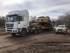 Трал перевозит спецтехнику по всему Казахстану 4