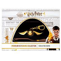Harry Potter: Набор брелоков Золотой Снитч, волшебная палочка 2шт
