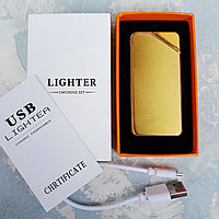 Электроимпульсная зажигалка. Фирма LIGHTER в подарочной коробке, золотистая.
