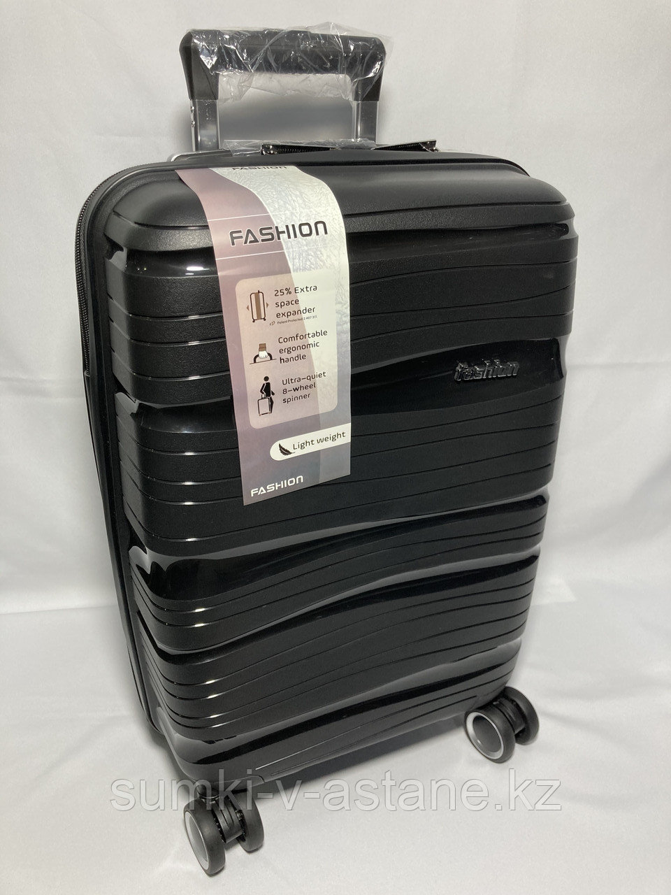 Маленький пластиковый дорожный чемодан на 4-х колёсах "Fashion" (высота 53 см, ширина 33 см, глубина 22 см)