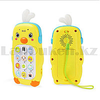 Детский игрушечный телефон с кнопками музыкальный Уточка