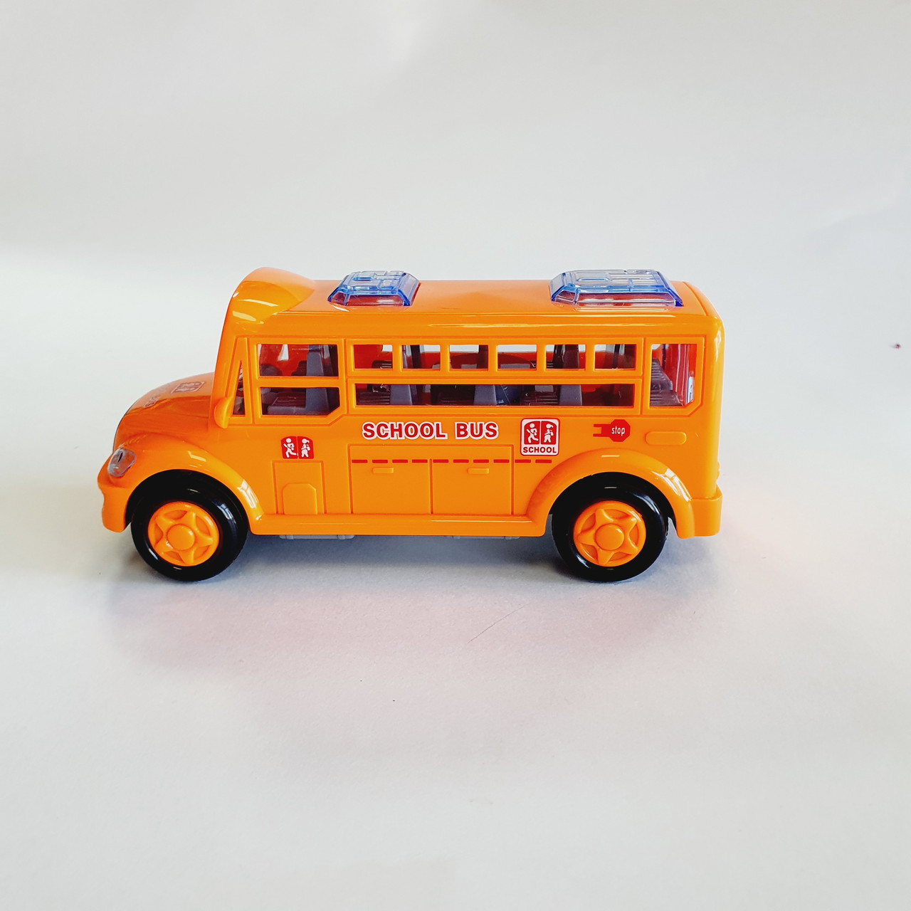 Игрушка автобус школьный на бат. 7704B - фото 4 - id-p108640964
