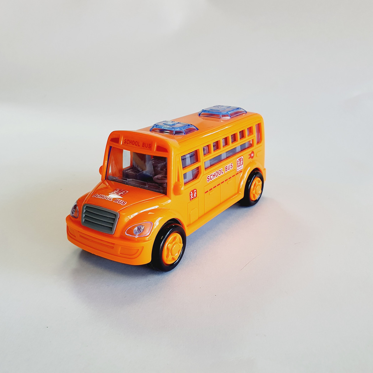 Игрушка автобус школьный на бат. 7704B - фото 1 - id-p108640964