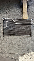 Радиатор кондиционера Mazda 626.