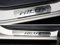 Накладки на пороги (лист шлифованный надпись Hilux) ТСС для Toyota Hilux Exclusive 2018-