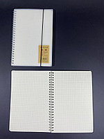 Блокнот на пружине в клетку