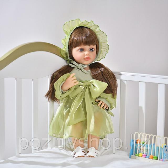 Кукла интерактивная Реборн в зеленом платье с бантом