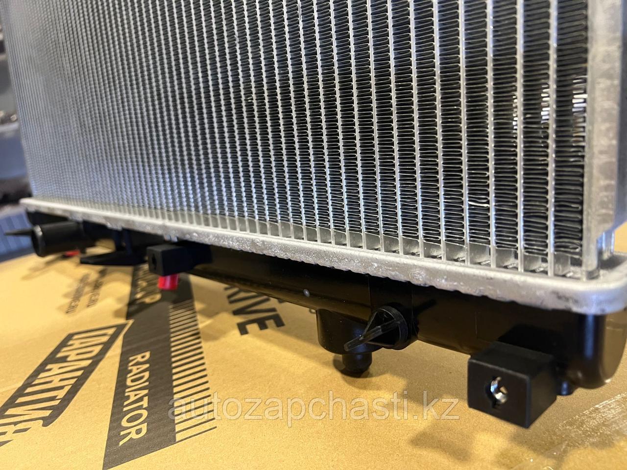 Радиатор охлаждения двигателя на Toyota Raum (JPR0090) - фото 2 - id-p113810868