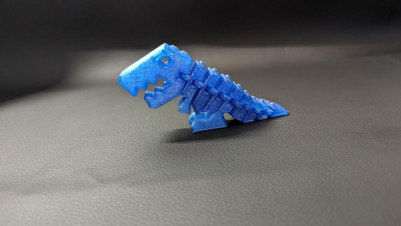 Гибкий Тираннозавр Рекс брелок игрушка антистресс оптом - фото 6 - id-p112912082