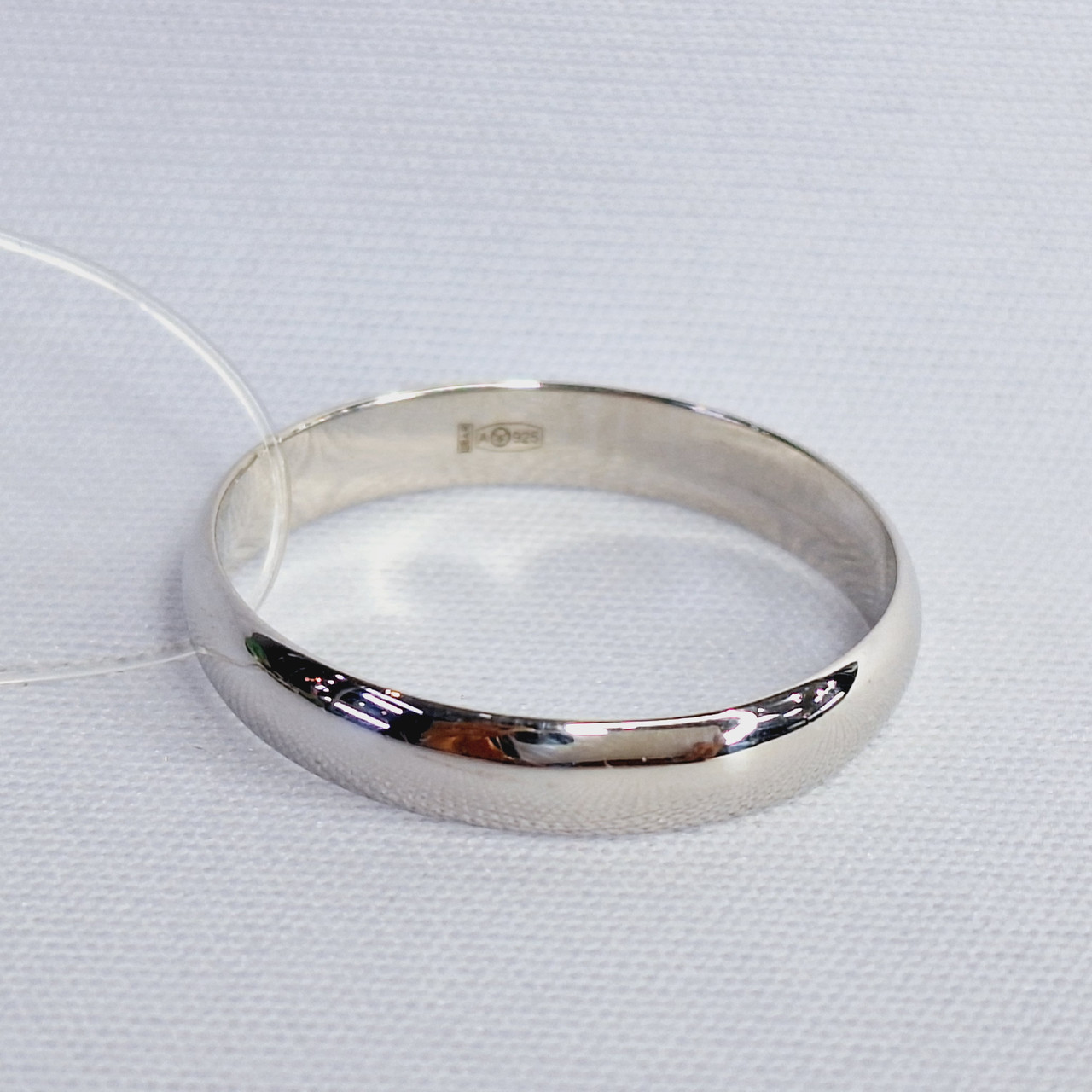 Серебряное обручальное кольцо Aquamarine 50346.5 покрыто родием коллекц. Love story - фото 1 - id-p83232833
