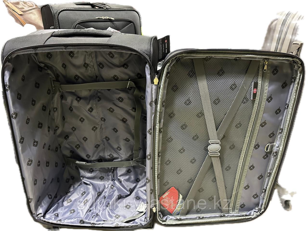 Средний дорожный чемодан из ткани на 4-х колёсах "Wemge Sabre". Высота 68 см, ширина 40 см, глубина 28 см. - фото 5 - id-p115061970