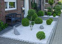 Белый декоративный камень в мешках