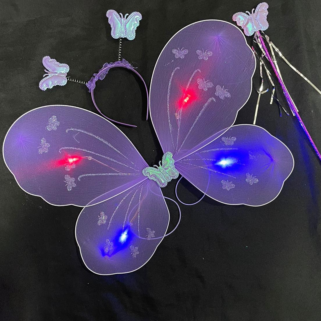 Крылья бабочки светящиеся фиолетовые - фото 1 - id-p115358787