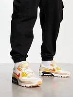 Nike Air Max 90 trainers in stone and orange