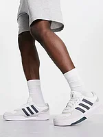 Adidas Originals Courtic trainers in white and navy