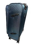 Средний дорожный чемодан на 4-х колёсах "Wemge Sabre". Высота 68 см, ширина 40 см, глубина 28 см., фото 4