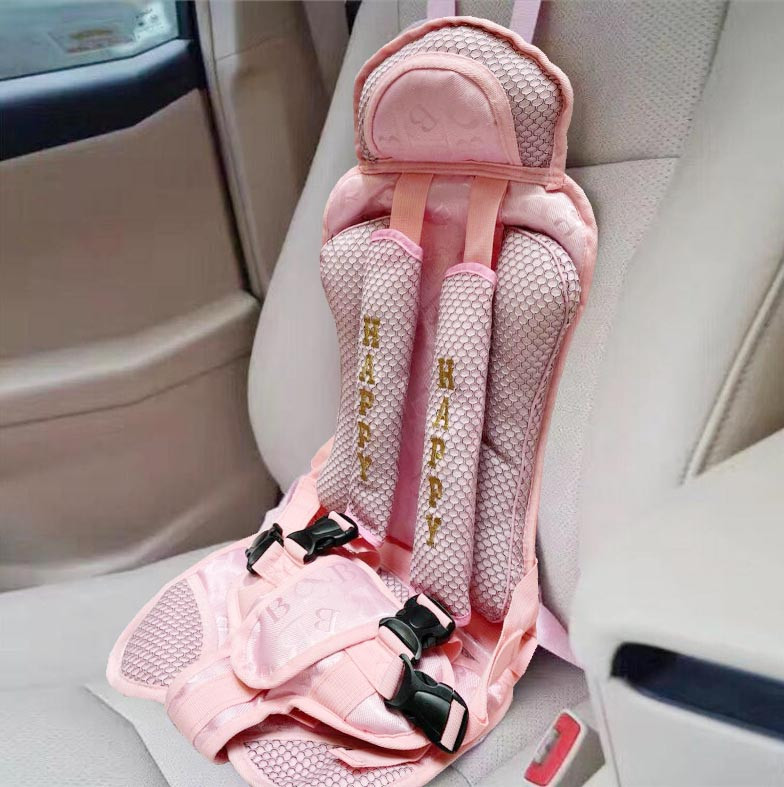 Детское сиденье в машину розовое
