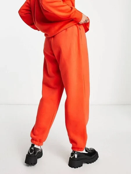 Nike Mini Swoosh oversized joggers in red - фото 4 - id-p116163212