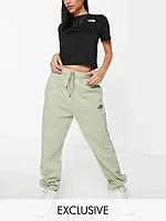 The North Face Essential joggers in green Exclusive at ASOS