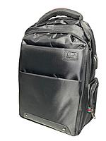 "Бақытты адамдар" ноутбугына арналған б лімі бар іскерлік рюкзак. Биіктігі 47 см, ені 31 см, тереңдігі 17 см.