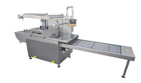 Машины для непрерывной упаковки продуктов в лотки TSA-626