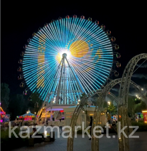 Реклама на Колесе обозрения в Астане