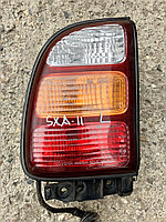 Фонарь задний левый Toyota RAV4 (SXA11)