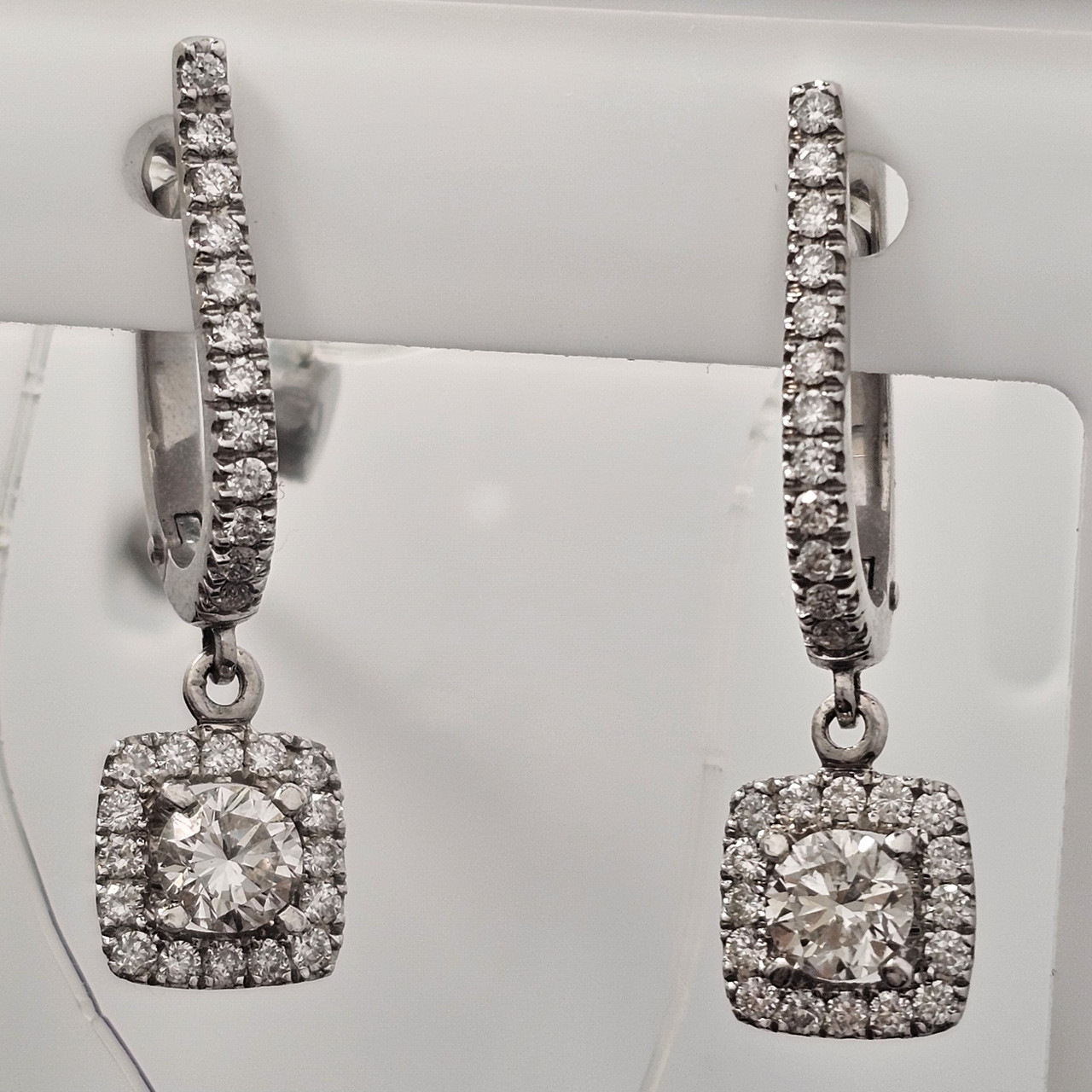 Сертификат IGI 1.01Ct VS1-SI1/J, VG-Cut Золотые серьги с бриллиантами
