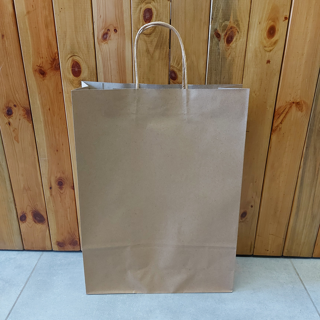 Большой Коричневый Крафтовый пакет с ручками 31*42 см. Пакет-сумка бумажный прочный. Упаковка для подарка., фото 1