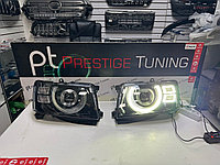 Передние фары на Nissan Patrol Y61 2005-10 дизайн DEFENDER