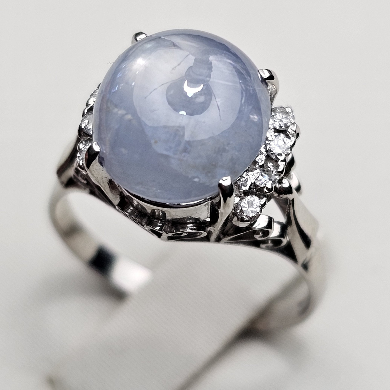 Кольцо Платина 900 пр, IGI .17р.звездчатый сапфир 6,37Сt .бриллиант 0,12Ct VS2-SI1/G-H