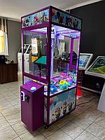 Игровой аппарат с игрушками хватайка