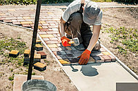 Услуги по укладке брусчатки