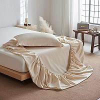 Простынь на резинке и две наволочки из тенселя размера 180х200 см.